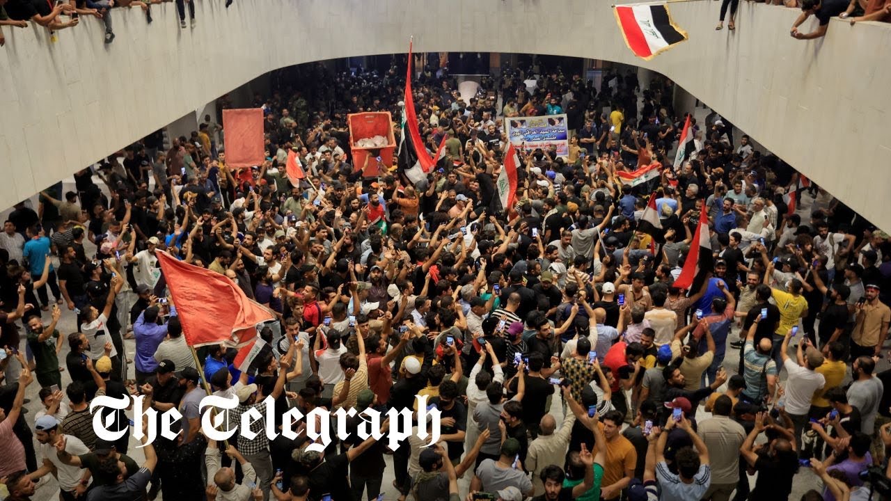Beobachten: Irakische Demonstranten stürmen das Parlament in Bagdads stark befestigter Grüner Zone