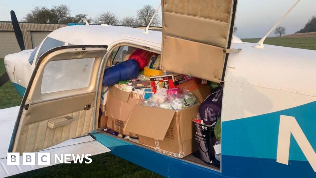 Dick Beath flying the plane to Poland