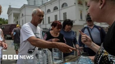 Locals receive drinking water in Kherson
