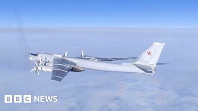 A Russian Tu-95MS strategic bomber performs a flight over the neutral waters of the Bering Sea, in this still image taken from a handout video released February 14, 2023