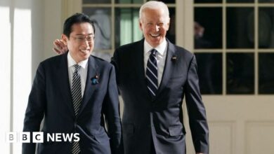 US President Joe Biden (L) is greeted by Japan's Prime Minister Fumio Kishida before their bilateral meeting in Hiroshima on May 18, 2023, ahead of the G7 Leaders' Summit.