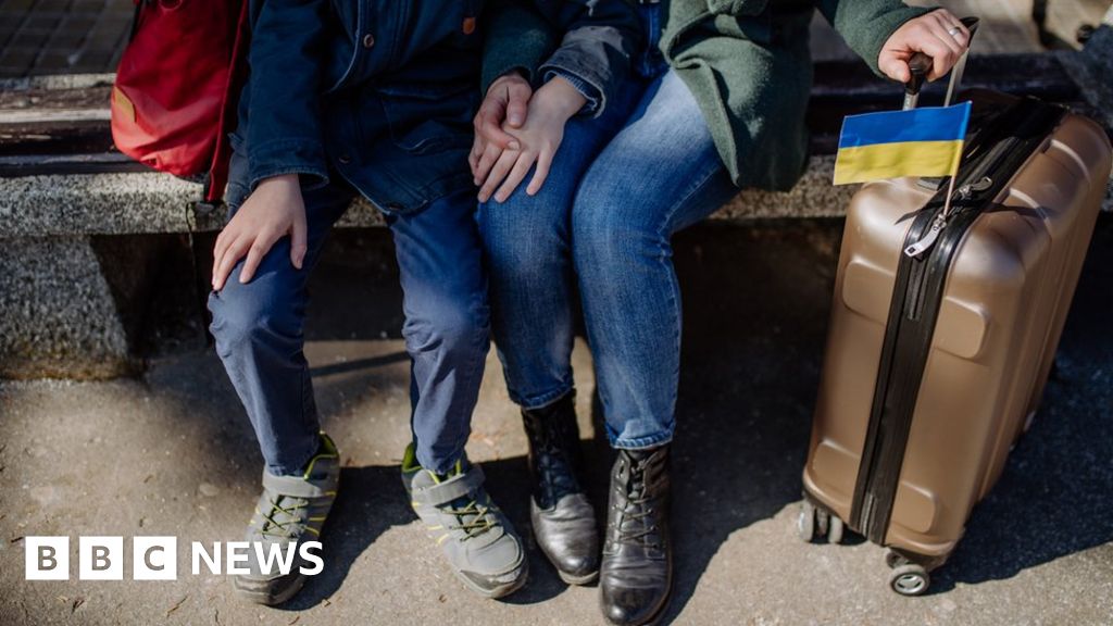 Ukrainian couple with luggage