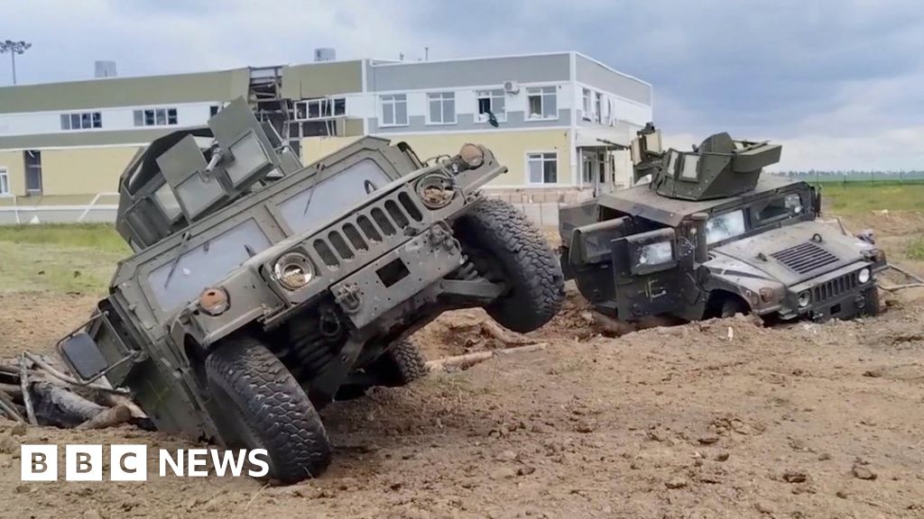 Two damaged US-made Humvee vehicles in Russia's Belgorod region