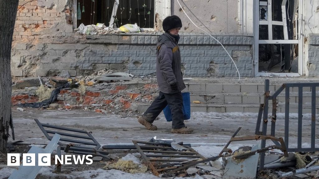 A man walks down a street in Bakhmut