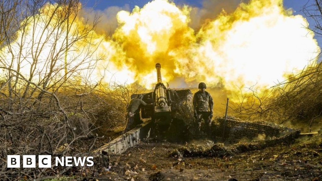 A Ukrainian soldier of an artillery unit fires towards Russian positions outside Bakhmut on November 8, 2022