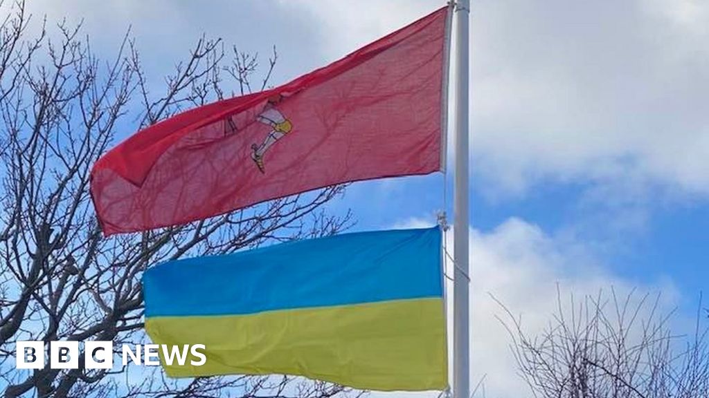 The Isle of Man and Ukrainian flags flying next to each other